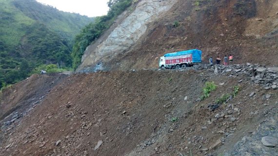 Goods-trucks-passing-the-newly-repaired-portion-of-Imphal-Jiribam-highway-on-Tuesday-1-570x320