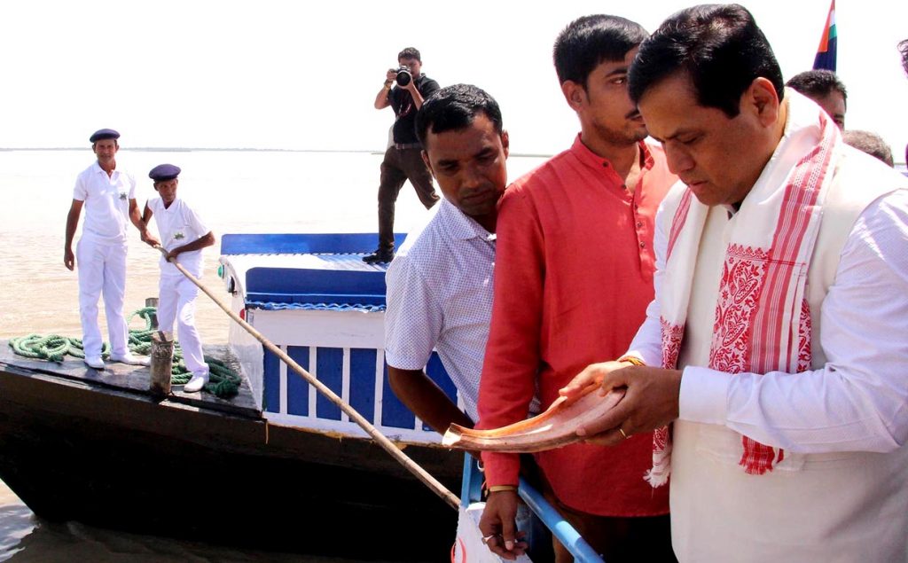 Chief Minister of Assam Sarbananda Sonowal flagging off services of four ferry vessels at Kamalabari Ghat in Majuli,Assam on 09-08-18.pix by ub photos