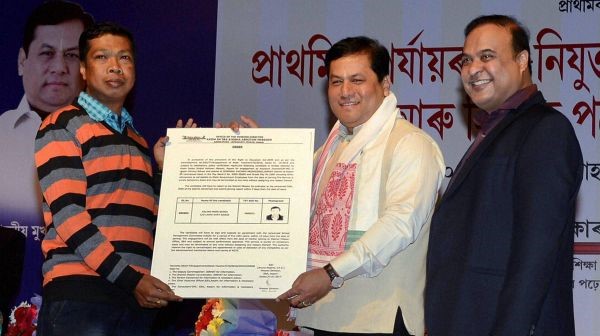 Assam-CM-hands-over-appointment-letter-to-assistant-teaher