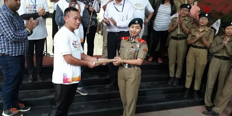 Leader of cyclists team from Kohima Shikato Aye handing over the cyclothon baton to the leader of cyclists team from Dimapur Asenla Imsong in Dimapur on Tuesday evening. Pic by Bhadra Gogoi