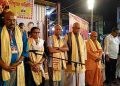 Susmita Dev along with former Union Minister Kabindra Purkayastha observing a minute's silence for the Tinsukia victims at the inauguration of a Kali puja pandal in Silchar