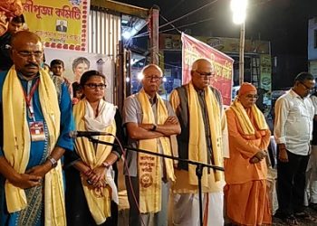 Susmita Dev along with former Union Minister Kabindra Purkayastha observing a minute's silence for the Tinsukia victims at the inauguration of a Kali puja pandal in Silchar