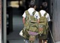 School-children-carry-heavy-bags