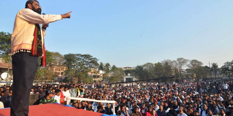 All Assam Students Union (AASU) chief advisor Dr. Samujjal kumar Bhattacharjee delivering lecture during All Assam Students Union (AASU) the mass agitation programme named Khilonjiar Brajaninad (thunderous volt by the indigenous people of Assam) statewide protests against the much-debated Citizenship (Amendment) Bill, 2016 in Latasil Playground,Guwahati on 23-01-19.pix by UB PHOTOS