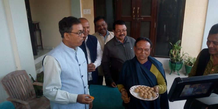 Ghatowar and his wife Jibon Tara Ghatowar celebrated with sweets