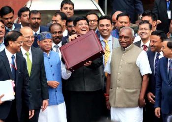 Interim Finance Minister Piyush Goyal along with minister of state Shiv Pratap Shukla and Pon Radhakrishnan, and the team of officials coming out of north block office on way to Parliament House to Present the Interim Budget in New Delhi on Friday. The Print Picture by Suraj Singh Bisht 01 feb 2019.
