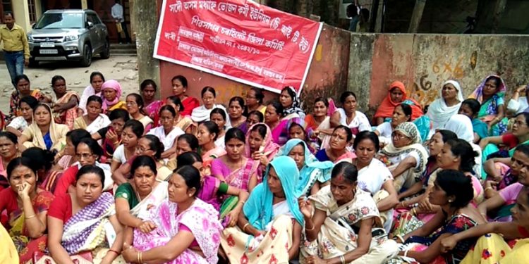 Assam workers protest against Govt decision of transferring Mid-day meal duty to NGO
