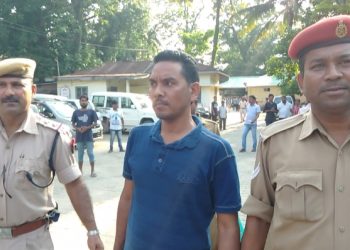 Cashier-cum-Head-Assistant-of-SMCH-Bidyut-Barman-being-produced-in-CJM-court-in-Silchar-on-Thursday
