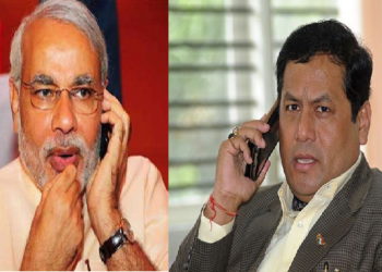 Modi And Sonowal with conversation