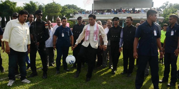 Sonowal playing football