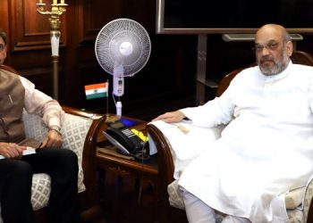 RN Ravi and Amit Shah