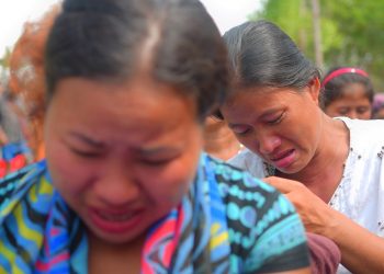 Bru migrants weep amidst a roads blockade protest at Dasda-Anandabzaaar area in North Tripura on Sunday while describing their plight in relief camps.