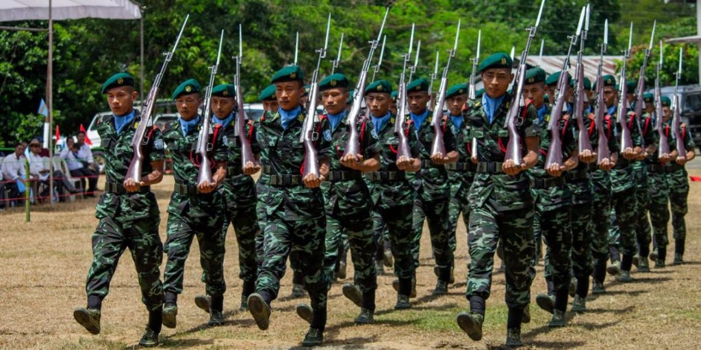 NSCN-IM-cadres-presenting-march-past-at-the-73rd-Naga-Independence-Day-celebration-at-Camp-Hebron-near-Dimapur-on-Wednesday.-1140x570
