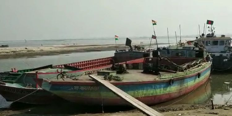 Two Bangladeshi barges – MV Sagar Express and MV Alvahar at Dhubri river port