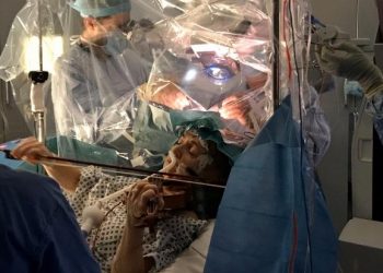 Patient plays violin while surgeons remove brain tumour in London's King's College Hospital
