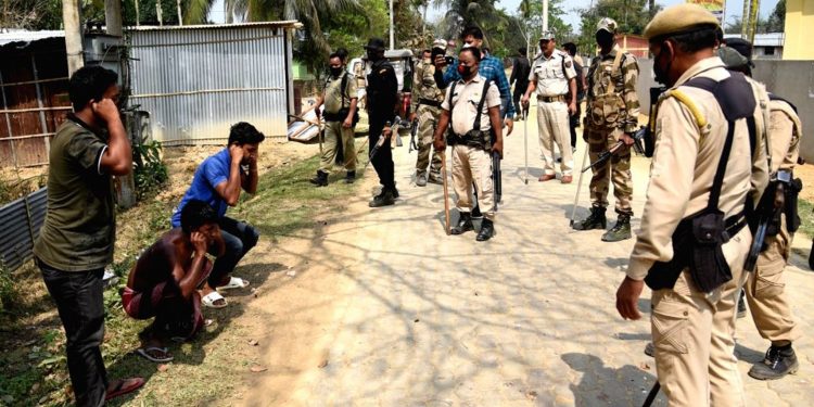1police-personnel-make-curfew-violaters-hold-their-1002640