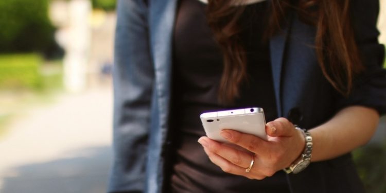 Woman_with_Phone_in_Hand