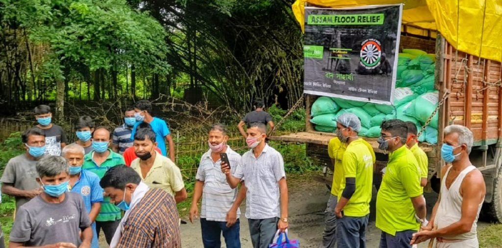 NGOs Round Table India, Zomato Feeding India distribute relief materials among flood victims in Bokakhat