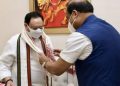 Assam-CM-offers-a-gamosa-to-JP-Nadda-1140x570