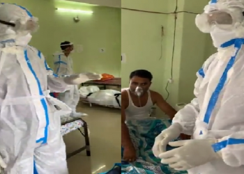 Dhuburi DC in Hospital with PPE kit