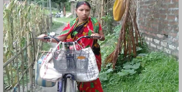 lady carrying business in bycycle