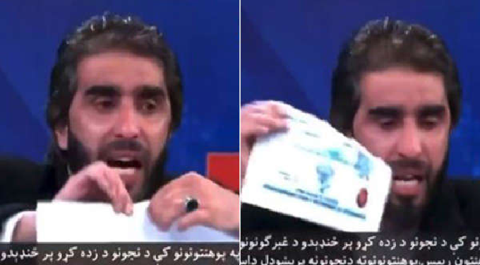 Afghan professor tears diploma certificate