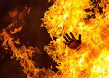 man sets house on fire