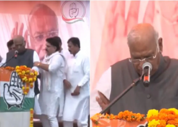 সভাত ভাষণৰ মাজতে অসুস্থ খাৰ্গেই নিজক চম্ভালি লৈ ক’লে, ‘মোডীক ক্ষমতাচ্যুত নকৰালৈকে জীয়াই থাকিম’
